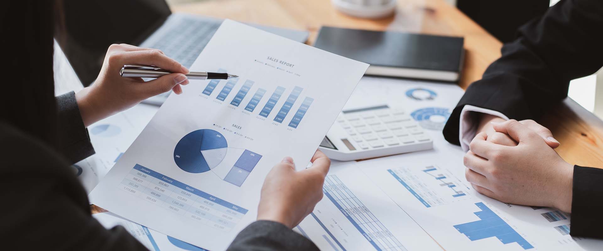 business advisor meeting to analyze and discuss the situation on the financial report in the meeting room.Investment Consultant,Financial Consultant,Financial advisor and accounting concept